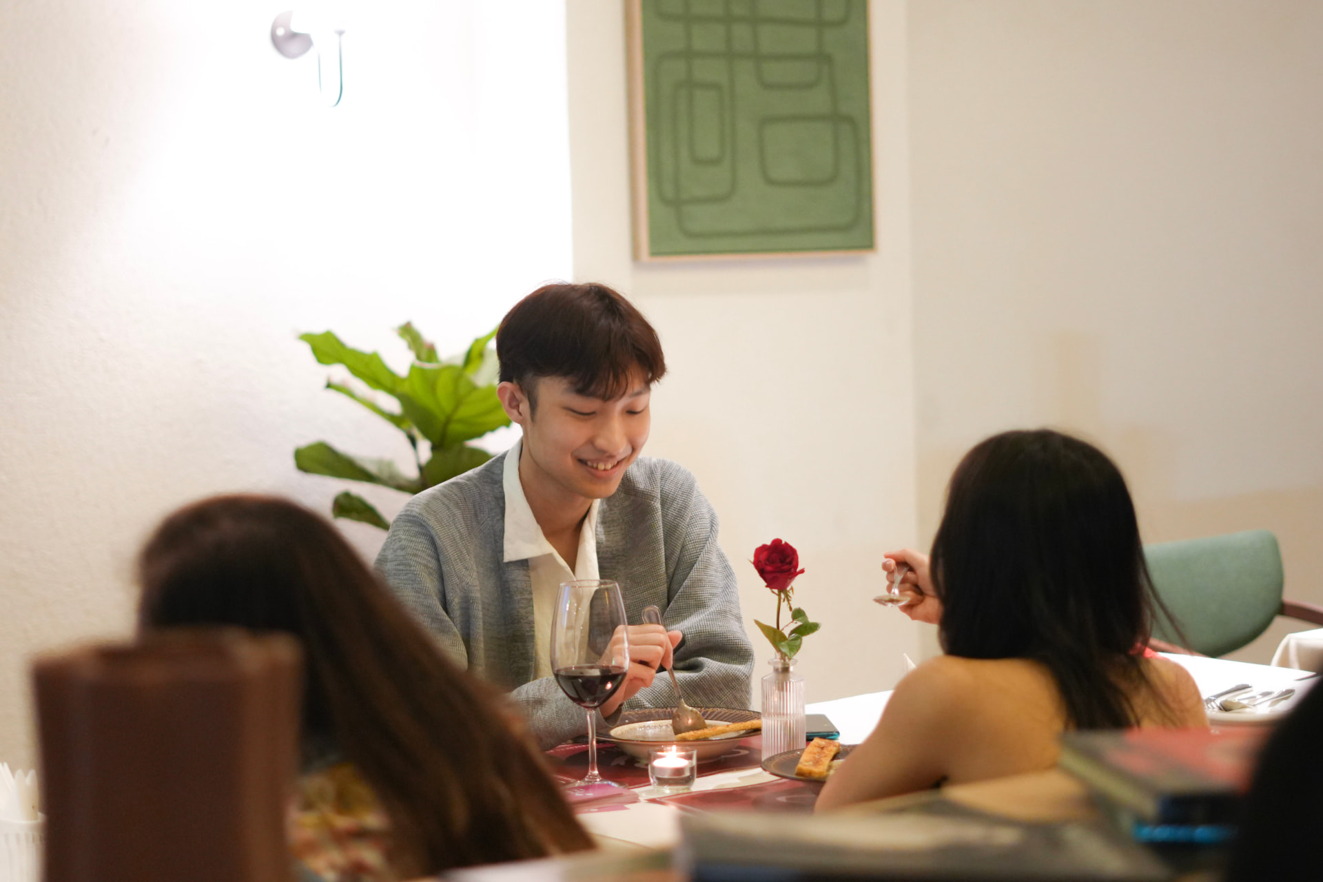 Guests dining together at a candlelit SPARC table