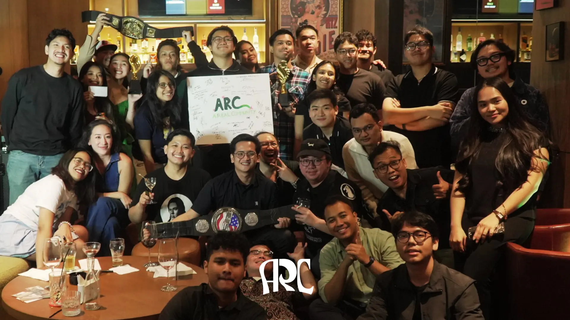 The whole ARC trivia crowd with the championship belt at Le Baron